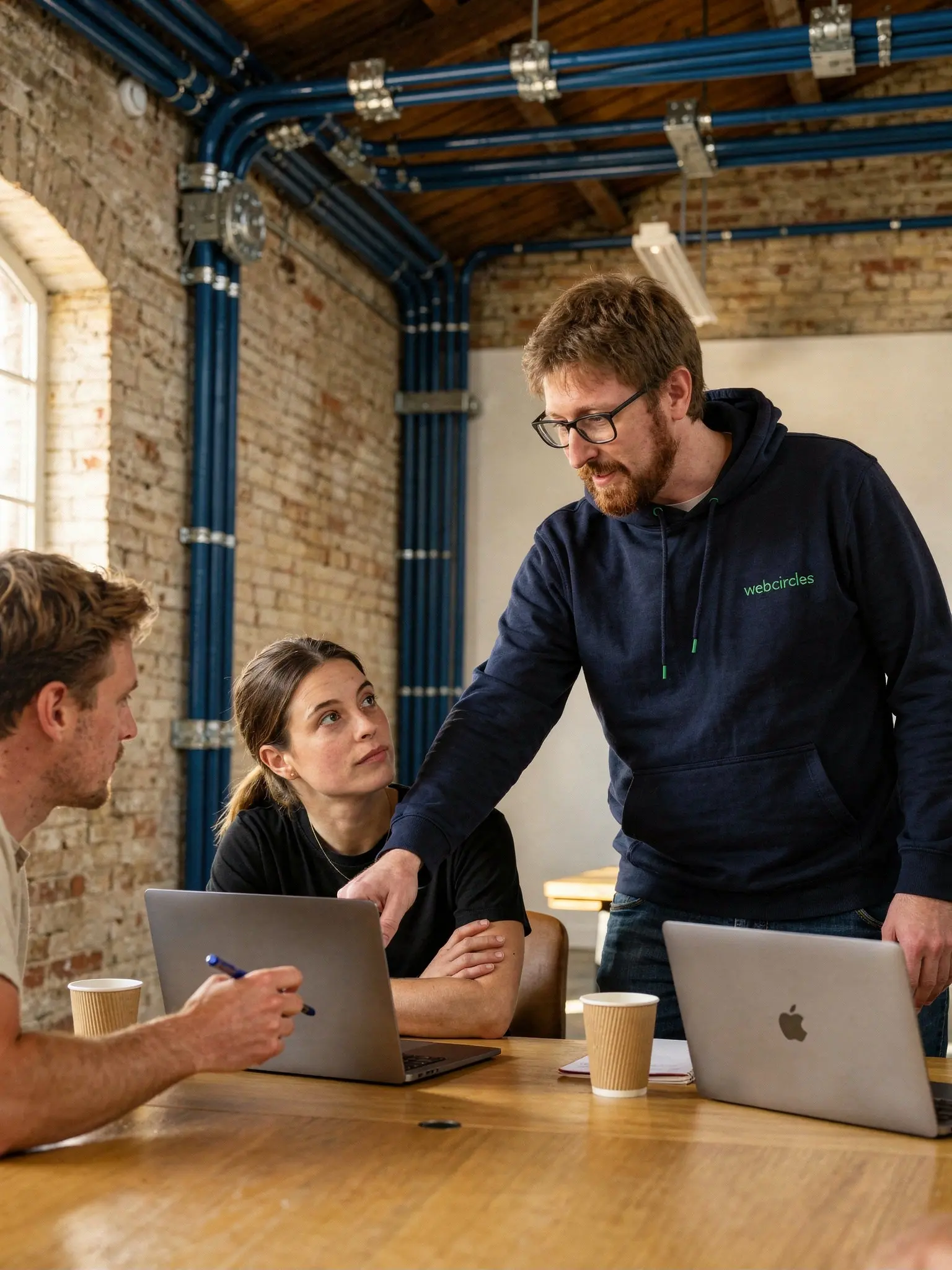 A Webcircles consultant is standing 